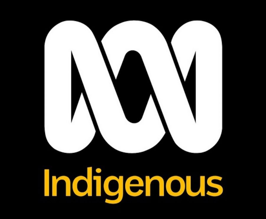 White graphic logo on black for ABC. Yellow text spelling Indigenous..