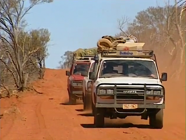 Video Screengrab of trucks driving on sandy roads in Australia..